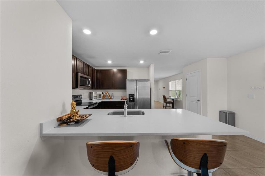 Furnished interior view inside a new home in Avalon Woods, Newberry (Image 9).