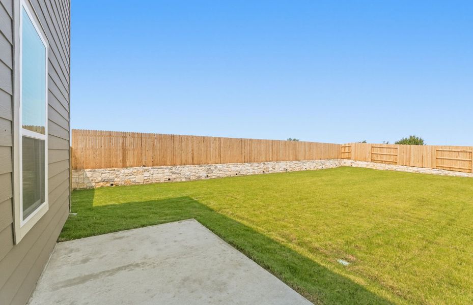 Exterior details and patio area of a home in Patterson Ranch, Georgetown (Image 27).