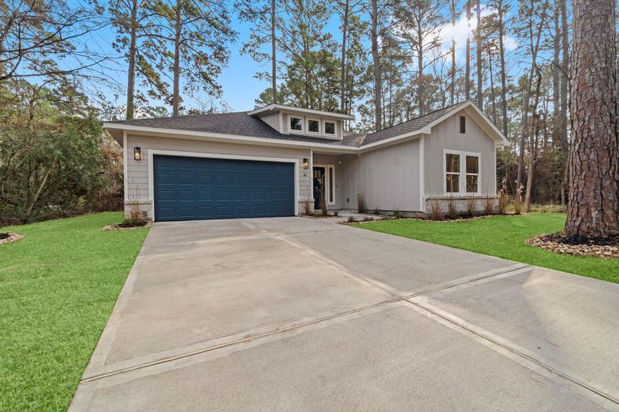 Front exterior of a new home in , Trinity, TX, highlighting curb appeal (Image 27).