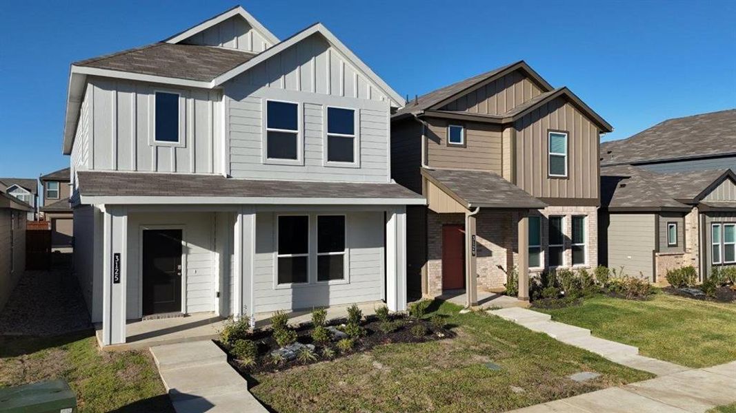 Front exterior of a new home in Orchard Village, Fort Worth, TX, highlighting curb appeal (Image 18). Front exterior of a new home in Orchard Village, Fort Worth, TX, highlighting curb appeal (Image 18).