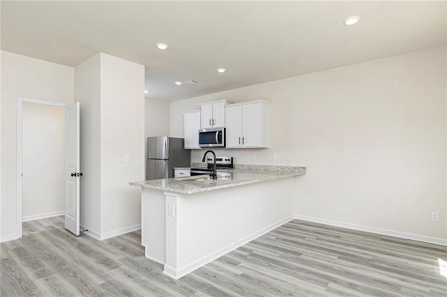Furnished interior view inside a new home in Lake Preserve at Jackson Trail, Jefferson (Image 6). Furnished interior view inside a new home in Lake Preserve at Jackson Trail, Jefferson (Image 6).