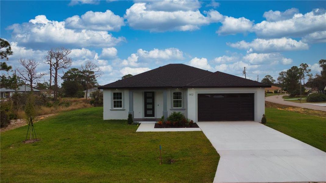 Front exterior of a new home in , Sebring, FL, highlighting curb appeal (Image 1). Front exterior of a new home in , Sebring, FL, highlighting curb appeal (Image 1).
