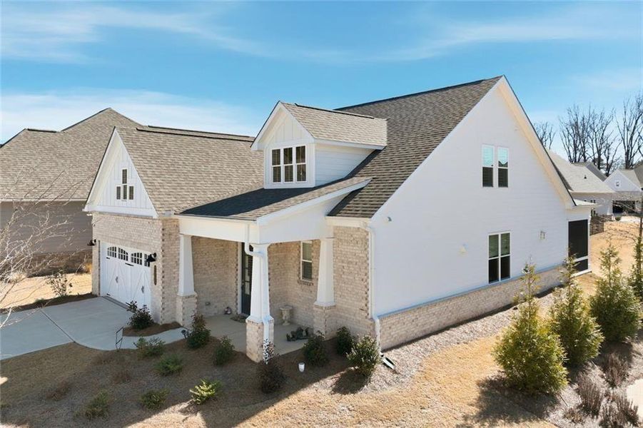 Front exterior of a new home in , Cumming, GA, highlighting curb appeal (Image 28). Front exterior of a new home in , Cumming, GA, highlighting curb appeal (Image 28).