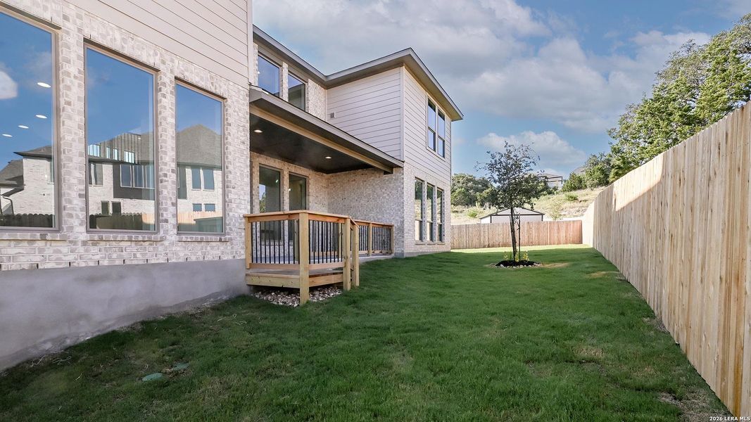 Exterior details and patio area of a home in Johnson Ranch, Bulverde (Image 17).