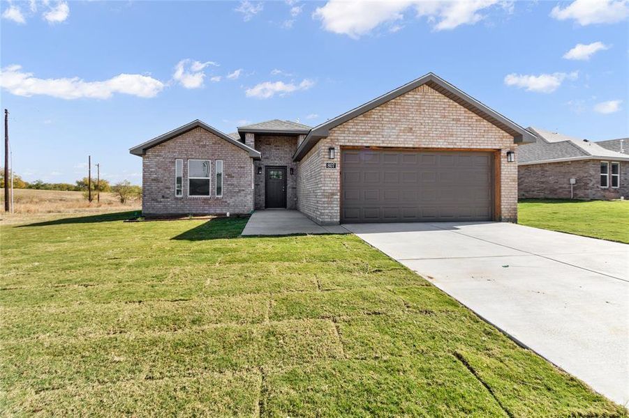 Front exterior of a new home in , Coleman, TX, highlighting curb appeal (Image 2). Front exterior of a new home in , Coleman, TX, highlighting curb appeal (Image 2).
