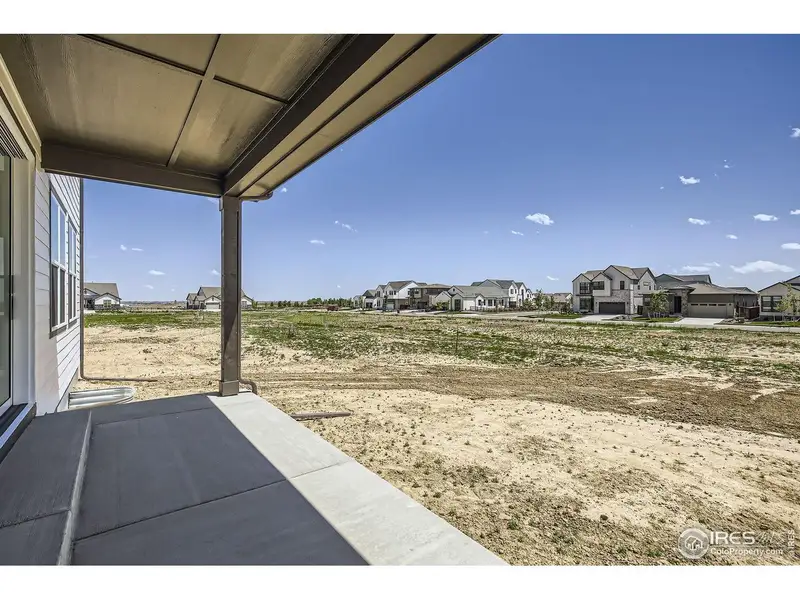 Exterior details and patio area of a home in RainDance, Windsor (Image 4).