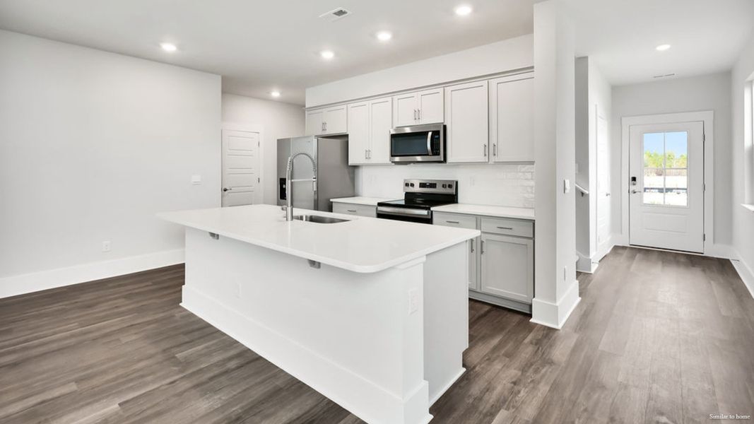 Furnished interior view inside a new home in Vineyard Trail, Jacksonville (Image 7).