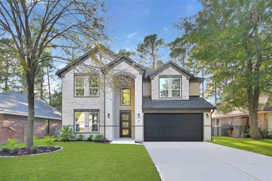 Front exterior of a new home in , Montgomery, TX, highlighting curb appeal (Image 1). Front exterior of a new home in , Montgomery, TX, highlighting curb appeal (Image 1).