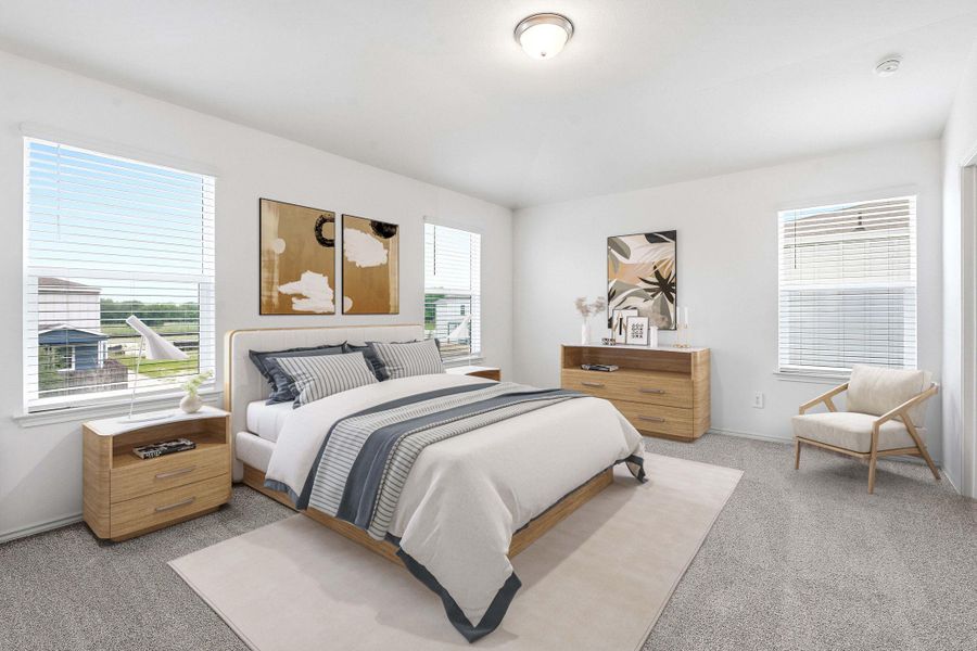 Spacious bedroom featuring light gray carpet flooring, multiple windows with blinds, a ceiling-mounted light fixture, and white wall finishes Spacious bedroom featuring light gray carpet flooring, multiple windows with blinds, a ceiling-mounted light fixture, and white wall finishes