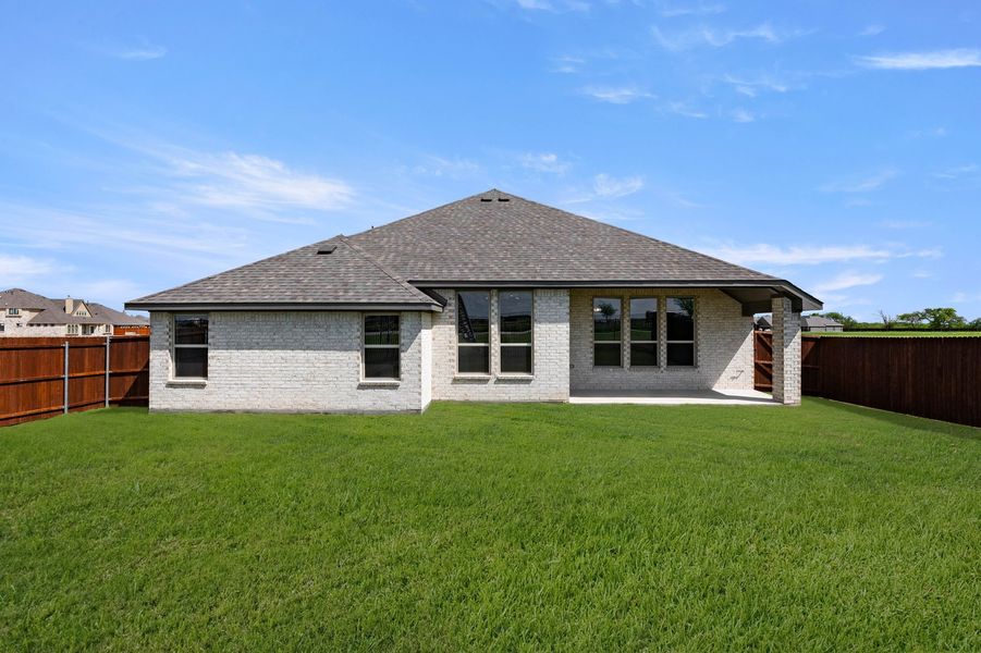 Front exterior of a new home in Timberbrook, Justin, TX, highlighting curb appeal (Image 27). Front exterior of a new home in Timberbrook, Justin, TX, highlighting curb appeal (Image 27).