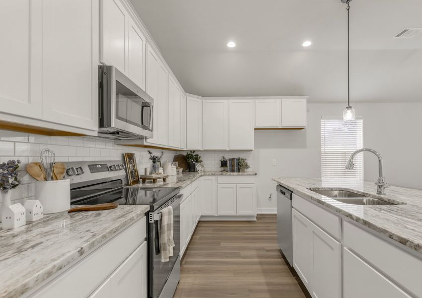 Representative furnished interior of a home built from the The Dahlia by Avonley Homes in Austin's Colony, Bryan (Image 8).