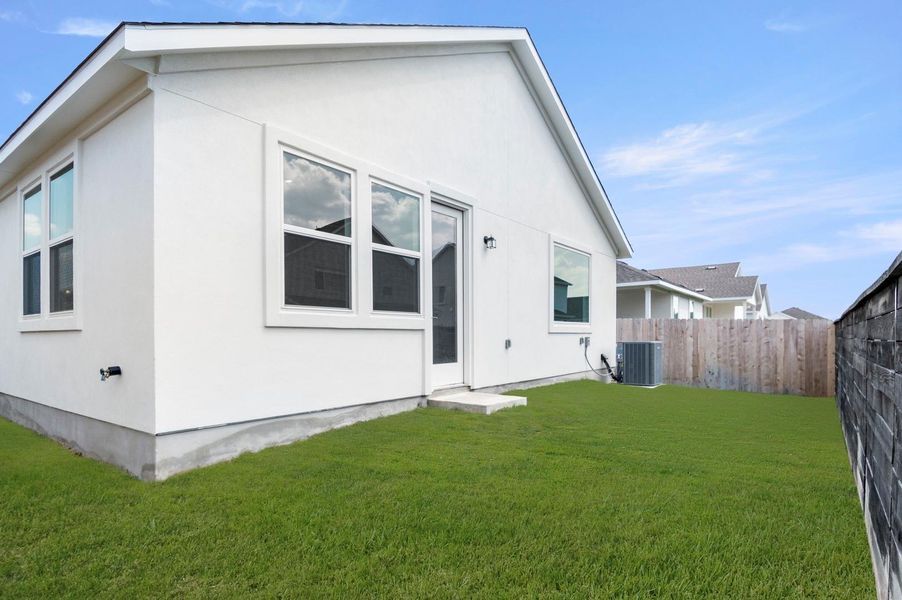 Exterior details and patio area of a home in The Enclave at Hidden Oaks, Georgetown (Image 20). Exterior details and patio area of a home in The Enclave at Hidden Oaks, Georgetown (Image 20).