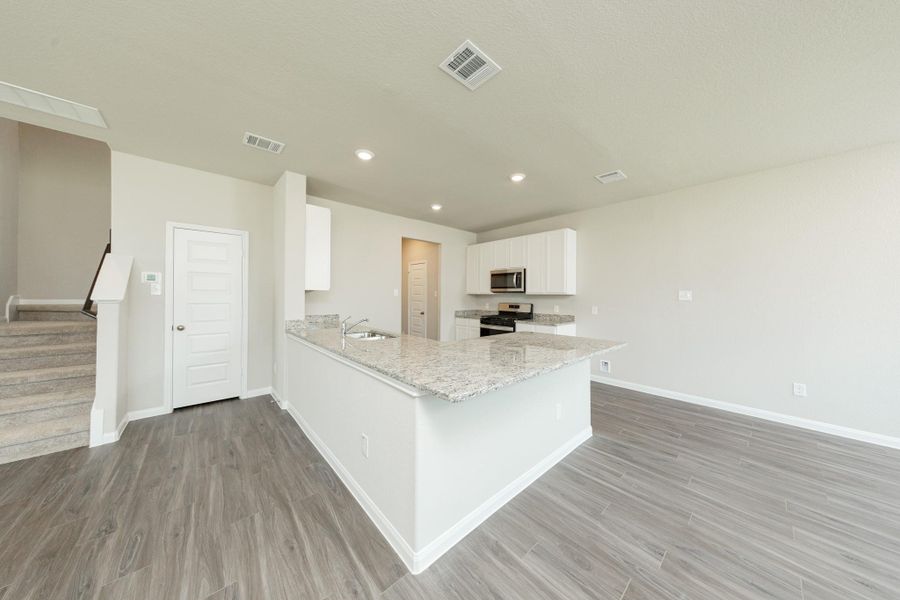 Furnished interior view inside a new home in Cliffstone Hills, Conroe (Image 4).
