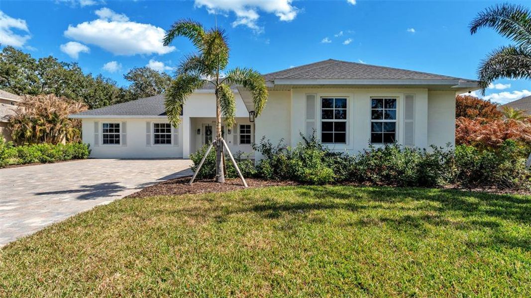 Front exterior of a new home in , Parrish, FL, highlighting curb appeal (Image 1). Front exterior of a new home in , Parrish, FL, highlighting curb appeal (Image 1).