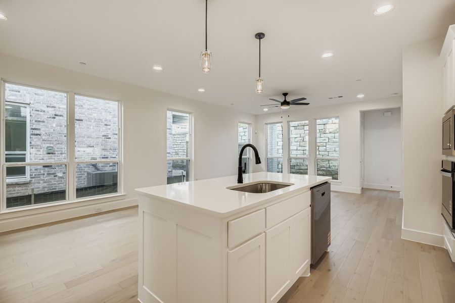 Furnished interior view inside a new home in Castle Hills Northpointe - Townhomes, Carrollton (Image 7). Furnished interior view inside a new home in Castle Hills Northpointe - Townhomes, Carrollton (Image 7).