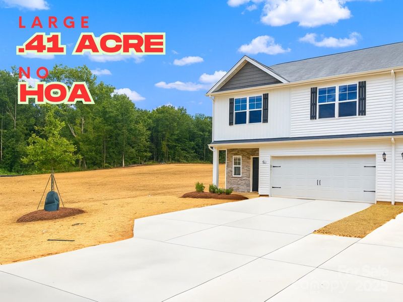 Front exterior of a new home in , Charlotte, NC, highlighting curb appeal (Image 14).