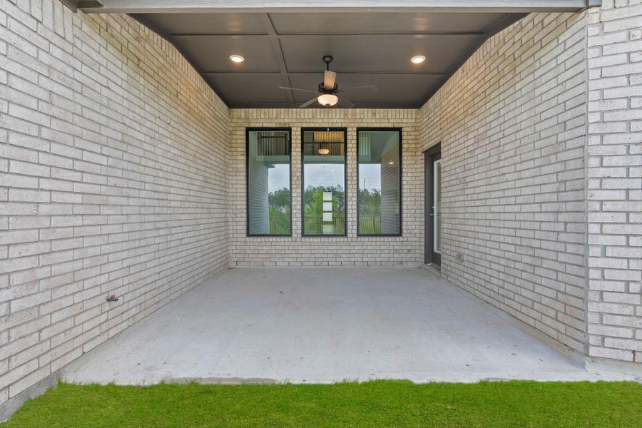 Exterior details and patio area of a home in Bridgeland, Cypress (Image 3).