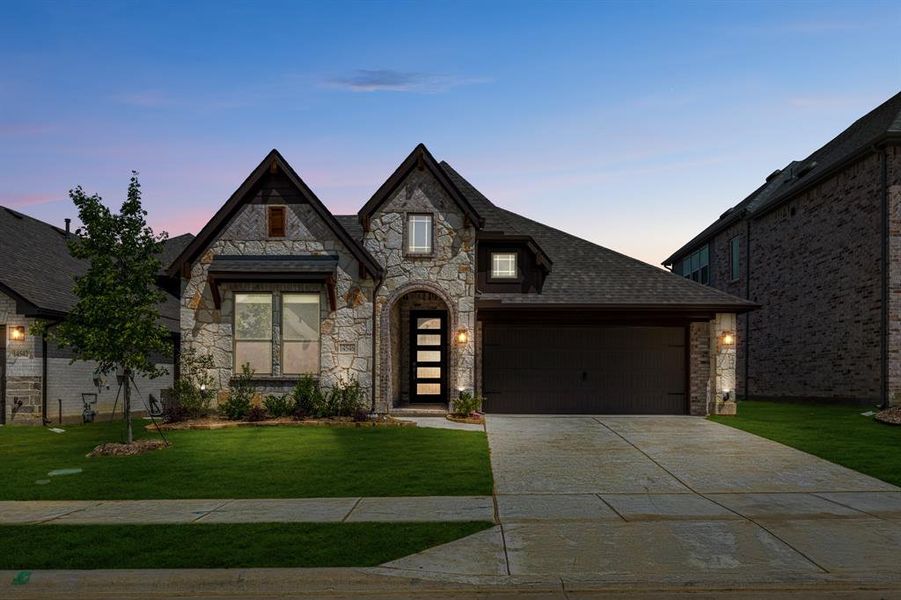 Front exterior of a new home in Creekview Meadows, Pilot Point, TX, highlighting curb appeal (Image 2).