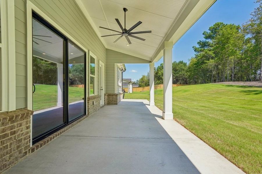 Exterior details and patio area of a home in Arden on Lanier, Cumming (Image 24).