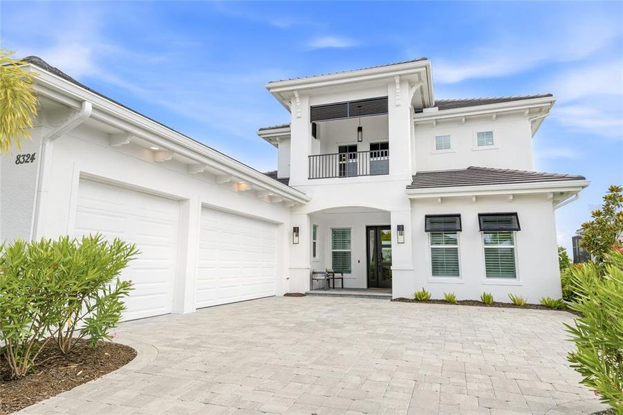 Front exterior of a new home in , Sarasota, FL, highlighting curb appeal (Image 25).