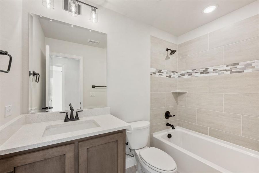 Furnished interior view inside a new home in Woodstone, Providence Village (Image 15). Furnished interior view inside a new home in Woodstone, Providence Village (Image 15).