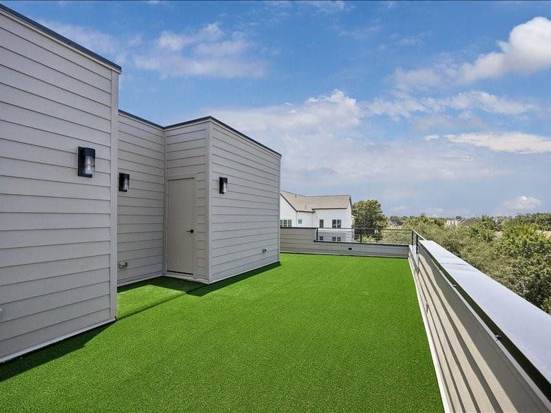 Exterior details and patio area of a home in , Houston (Image 23).
