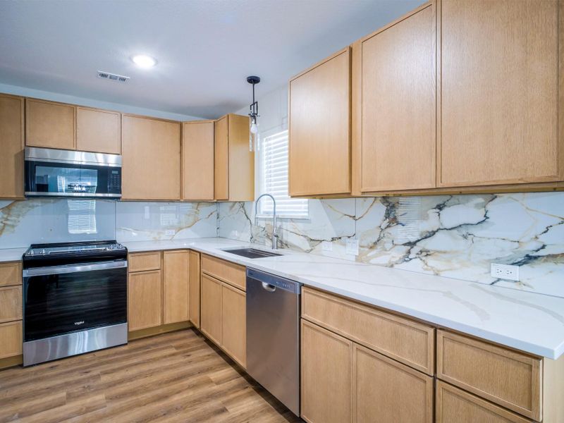 Furnished interior view inside a new home in , Granite Shoals (Image 7).
