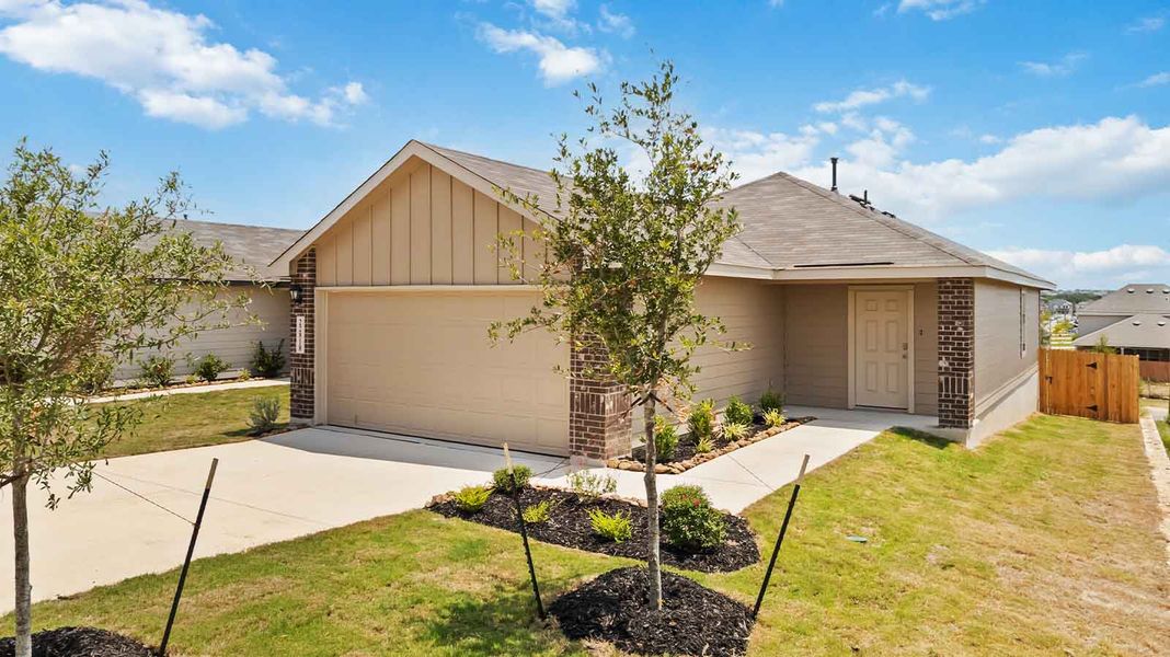 Representative exterior photo of a completed home built from the Atlanta by D.R. Horton in Watermark, Alvin, TX (Image 2).