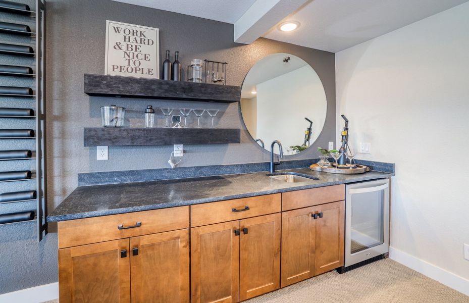 Furnished interior view inside a new home in Hilltop at Inspiration, Aurora (Image 24).