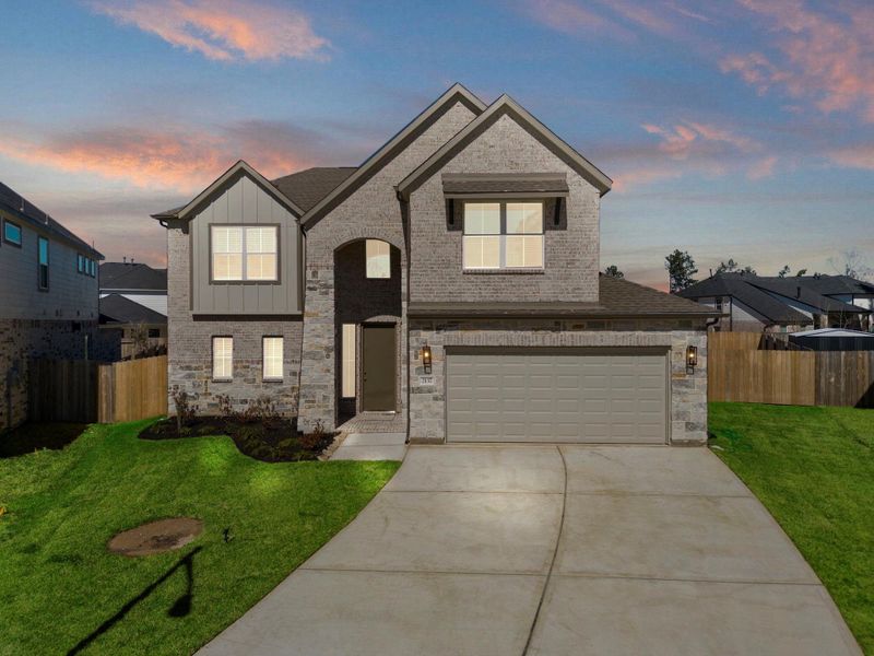 Front exterior of a new home in Barton Creek Ranch, Conroe, TX, highlighting curb appeal (Image 21). Front exterior of a new home in Barton Creek Ranch, Conroe, TX, highlighting curb appeal (Image 21).