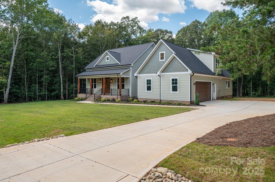 Front exterior of a new home in , Lincolnton, NC, highlighting curb appeal (Image 23).
