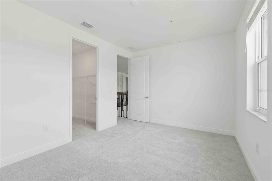 Spacious, unfurnished interior of a new home in Creeks Edge at Twin Rivers, Parrish (Image 69).