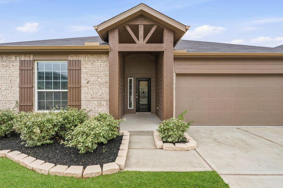 A warm and stylish entryway sets the tone for the comfort and quality waiting inside. A warm and stylish entryway sets the tone for the comfort and quality waiting inside.