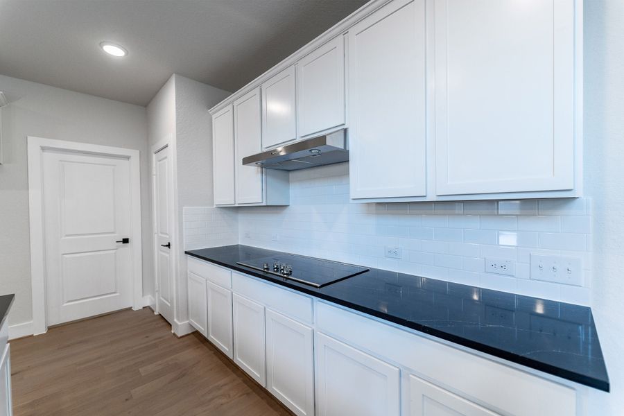 Furnished interior view inside a new home in The Woodlands at Medina Hills, Mico (Image 6).