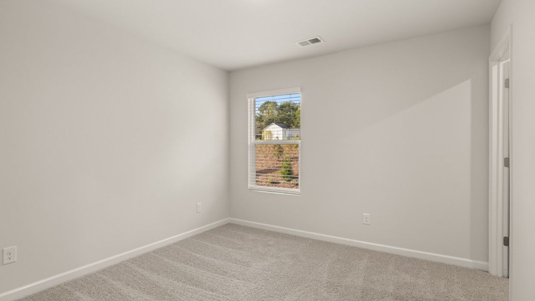 Representative unfurnished interior of a home built from the Darwin by D.R. Horton in Poplar Preserve, Newnan (Image 22).