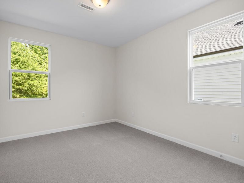 Spacious, unfurnished interior of a new home in Woodland Crossing, Zebulon (Image 20).