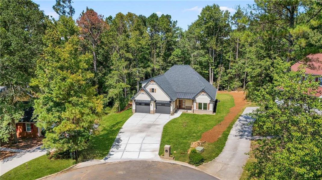 Front exterior of a new home in , Snellville, GA, highlighting curb appeal (Image 22).
