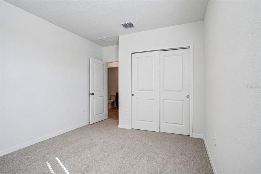 Spacious, unfurnished interior of a new home in Ridgehaven - Villas, Ormond Beach (Image 32).