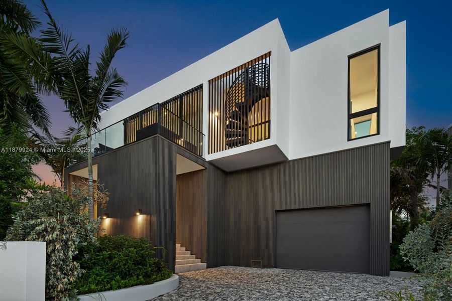 Front exterior of a new home in , Miami Beach, FL, highlighting curb appeal (Image 25).