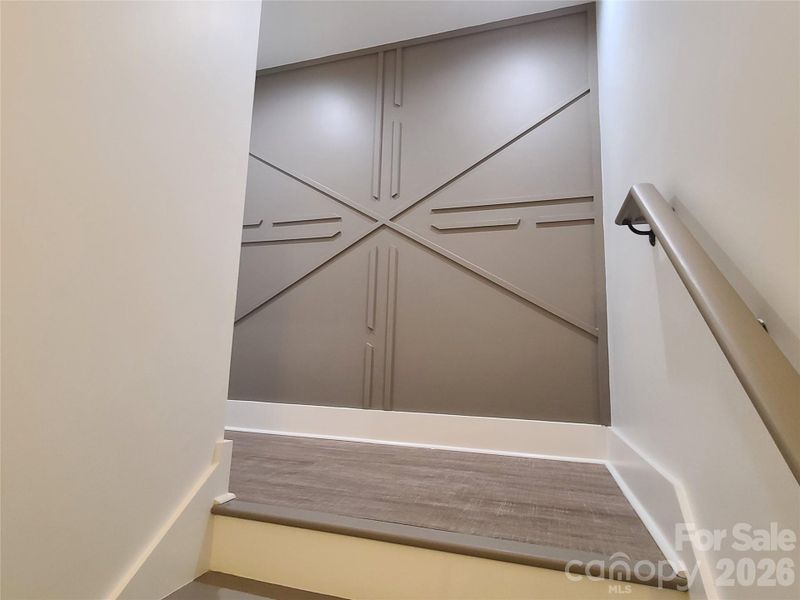 Accent wall on landing to downstairs