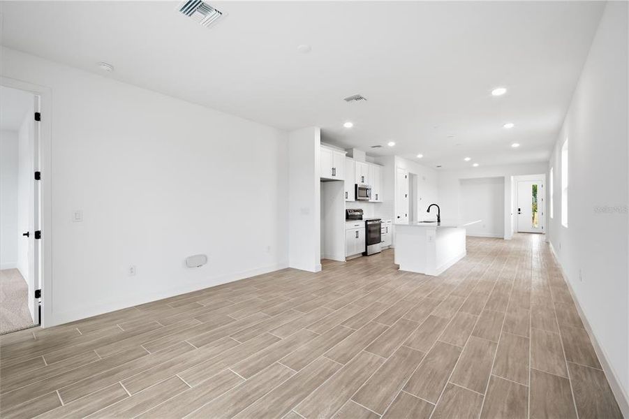 Spacious, unfurnished interior of a new home in Estates at Rivers Edge, Parrish (Image 23).