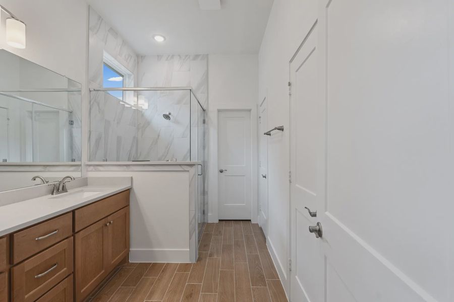 Representative furnished interior of a home built from the Torrey Pines by Chesmar Homes in Riceland Alley Loads, Mont Belvieu (Image 10).