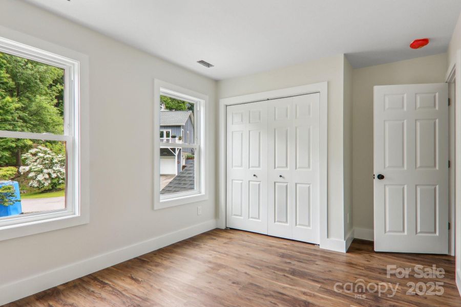 Spacious, unfurnished interior of a new home in , Waynesville (Image 24).