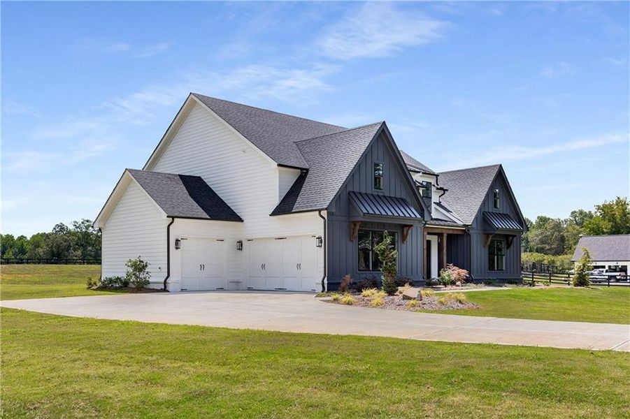 Front exterior of a new home in , Alpharetta, GA, highlighting curb appeal (Image 2). Front exterior of a new home in , Alpharetta, GA, highlighting curb appeal (Image 2).