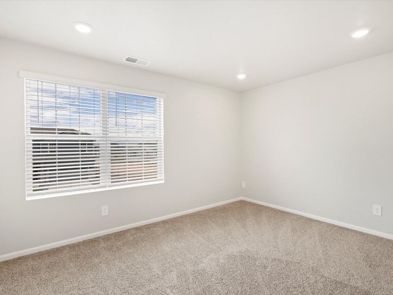 Spacious, unfurnished interior of a new home in Buffalo Highlands: The Flora Collection, Commerce City (Image 15).