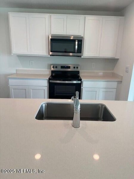 Furnished interior view inside a new home in Rookery, Green Cove Springs (Image 5). Furnished interior view inside a new home in Rookery, Green Cove Springs (Image 5).