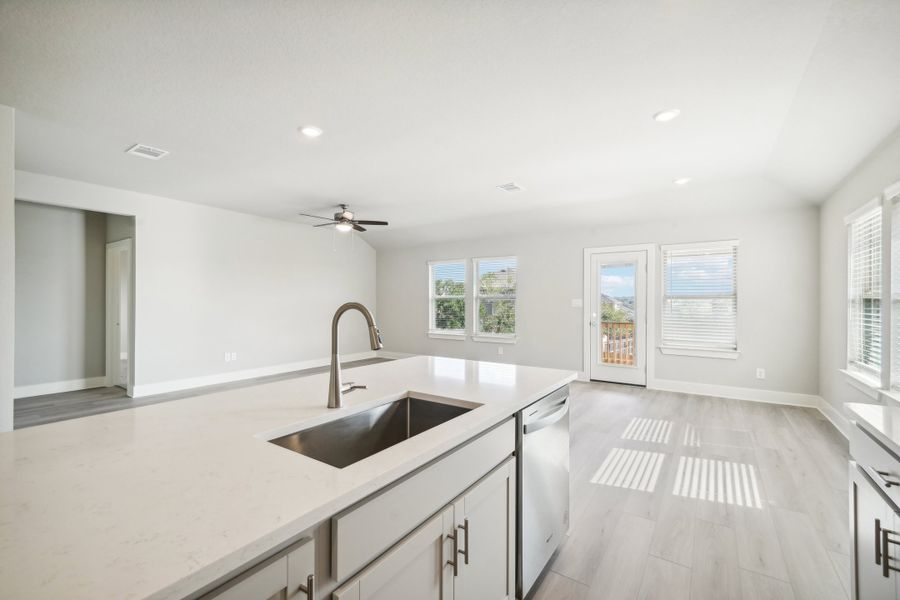 Kitchen in the Preston floorplan at a Meritage Homes community.