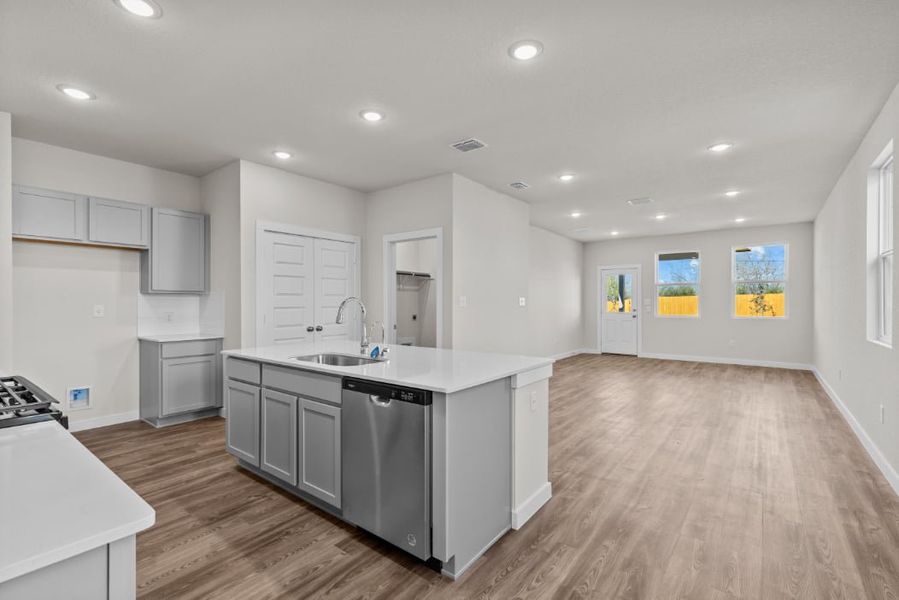 A kitchen with white cabinets. A kitchen with white cabinets.