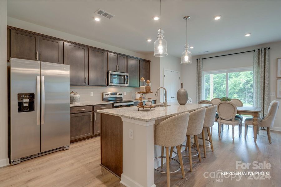 Previous model -Kitchen floor plan changed on this plan adding a corner pantry.