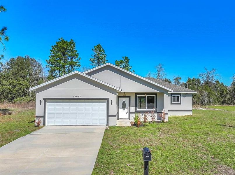 Front exterior of a new home in , Ocala, FL, highlighting curb appeal (Image 31).